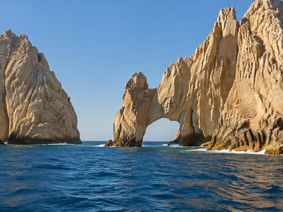 Illustrative destination scene for Los Cabos, Mexico; not a photograph of a listed property